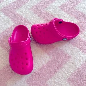Pink crocs